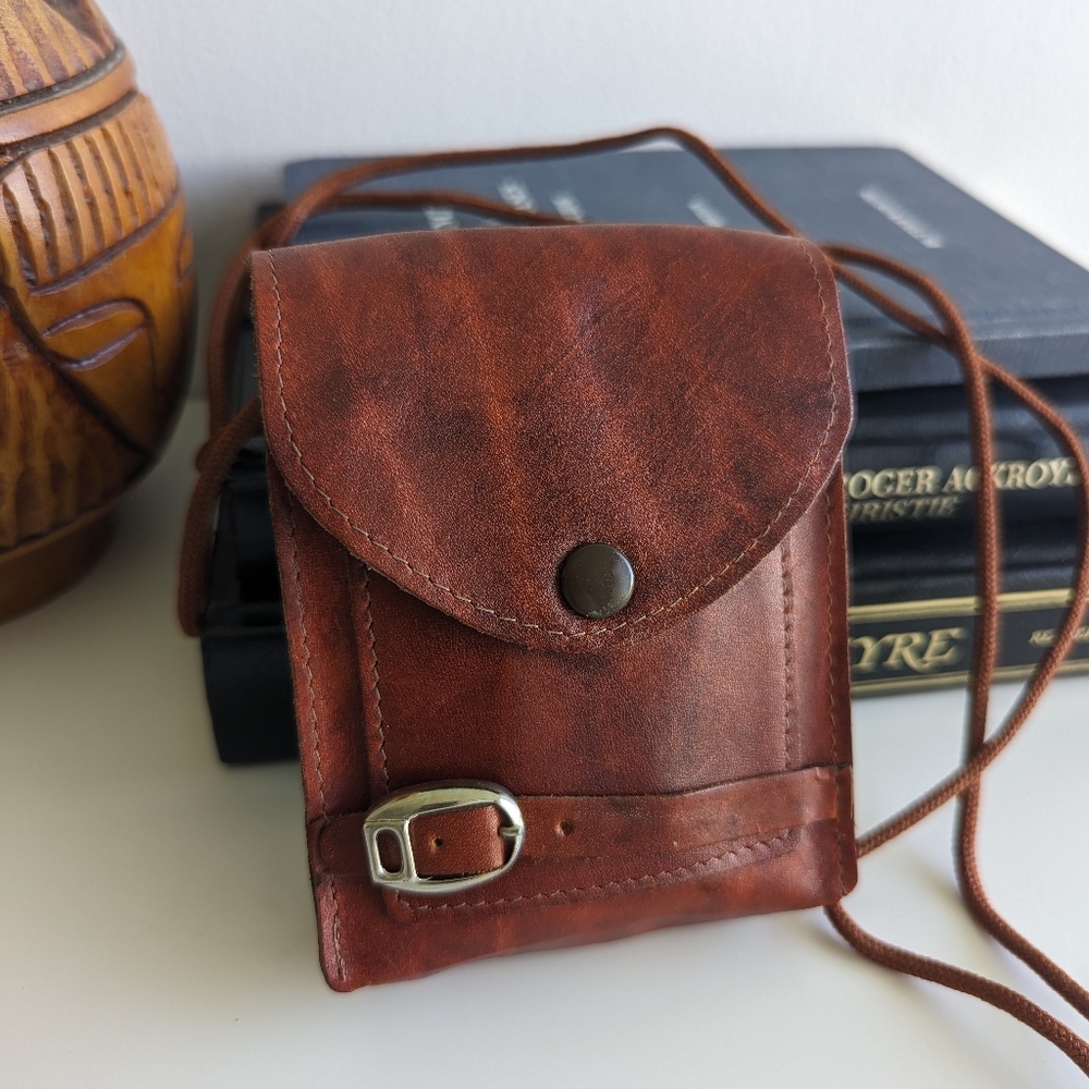 Small Vintage Buxton Leather Pouch style purse on cotton string